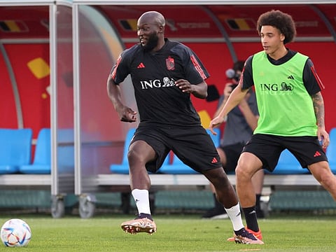 Belgium's Romelu Lukaku (left) and Axel Witsel take part in a training session of his team at the Salwa Training Site in Salwa Beach, southwest of Doha.