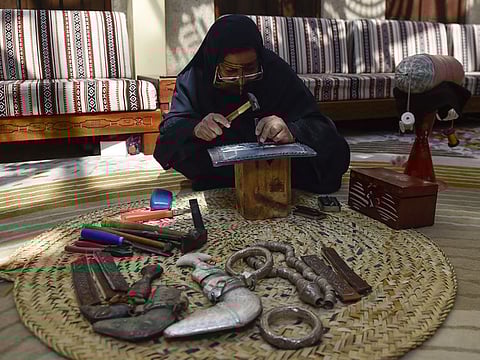 An artisan at work in the newly opened Centre for Traditional Handicrafts and Heritage in the Al Shindagha Heritage District in Dubai