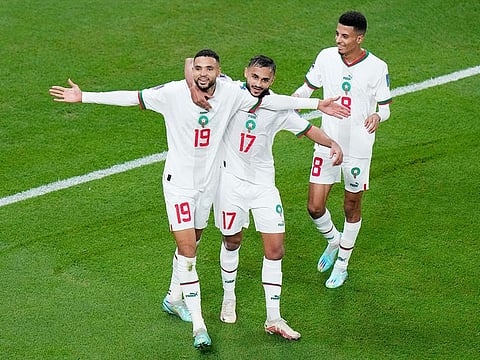 Morocco's Youssef En-Nesyri, left, celebrates after he scored his side's second goal during the World Cup group F match against Canada and at the Al Thumama Stadium in Doha , on Thursday, December 1, 2022. 
