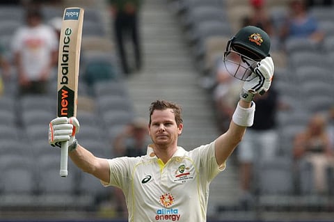 Australia's Steve Smith celebrates after reaching his double century during the second day of the first Test against West Indies at Perth Stadium on Thursday.