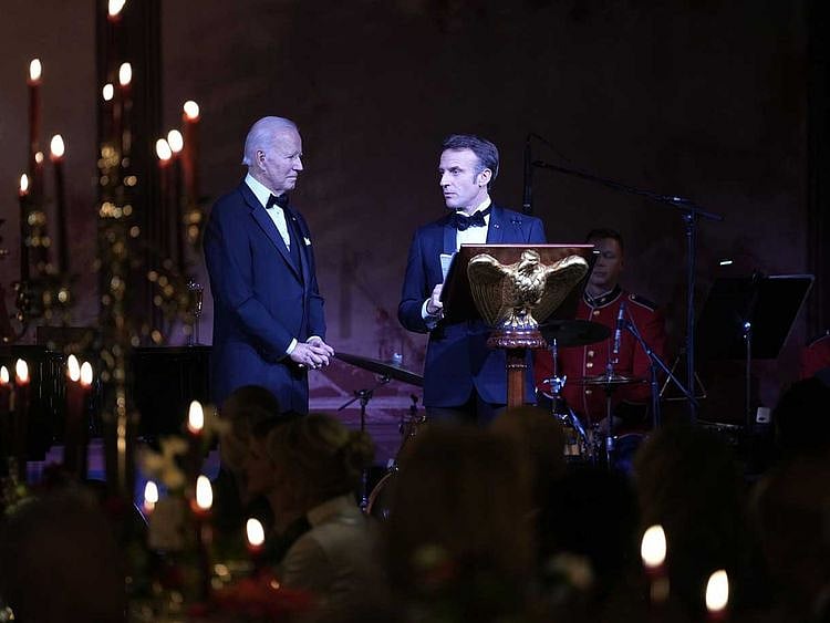 Emmanuel Macron, France's president, right, speaks as US President Joe Biden