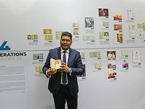 Riyaz Kilton showing old documents and photos in his office, his grandfather Hamza Abookacker came to Dubai in 1948 and now  the 4th generation is living in UAE. Photo: Virendra Saklani/Gulf News