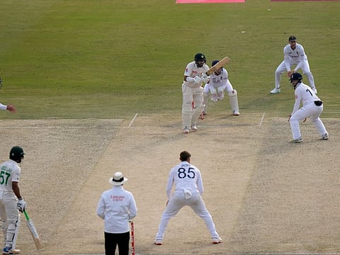 Pakistan's Imam-ul-Haq plays a shot during his half-century against England. The placid Rawalpindi pitch has come criticism from PCB chief Ramiz Raja.