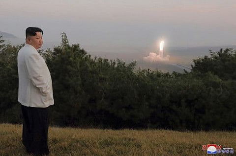 This photo provided  by the North Korean government, North Korean leader Kim Jong Un inspects a missile test at an undisclosed location in North Korea, as taken sometime between Sept. 25 and Oct. 9.