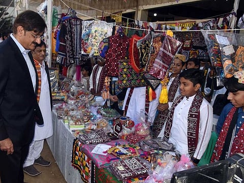 Sindh Chief Minister Syed Murad Ali Shah visits schoolchildren to celebrate Sindhi Culture Day. 
