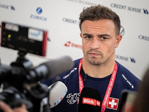 Switzerland's midfielder Xherdan Shaqiri speaks with journalists at the University of Doha for Science and Technology in Doha ahead of their last 16 FIFA World Cup clash against Portugal.