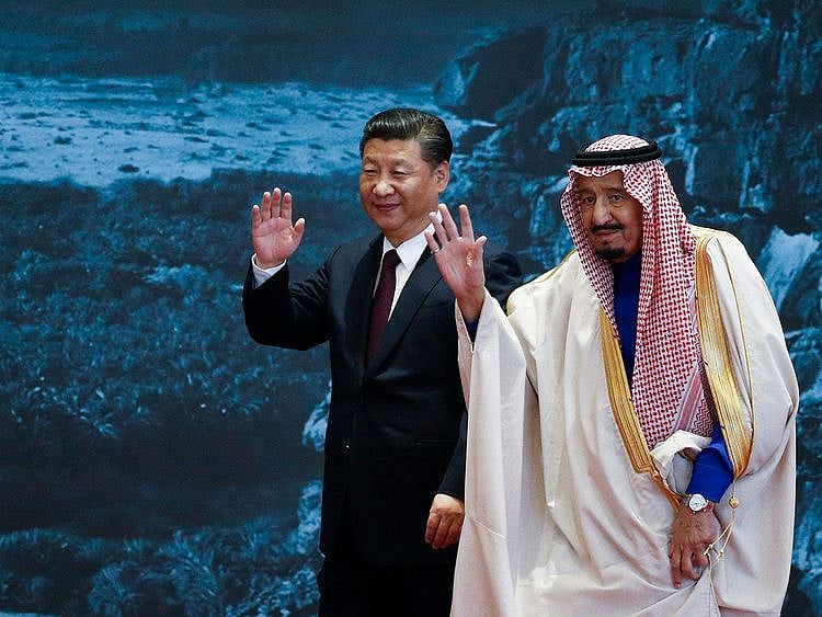 In this photo taken on March 16, 2017 China's President Xi Jinping and Saudi King Salman bin Abdul Aziz attend the "Road to the Arab Republic" - the closing ceremony for artifacts unearthed in Saudi Arabia, at China National Museum in Beijing.  