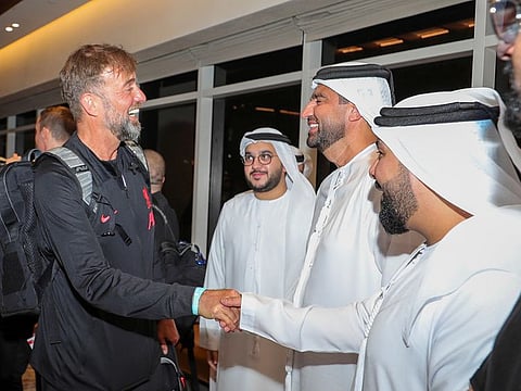 Welcome to Dubai! Liverpool boss Jurgen Klopp (left) was welcomed by the Dubai Super Cup's supreme organizing committee chairman, Mr. Ahmed Hashem Khoury, and other dignitaries. 