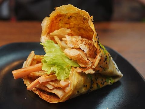 Jianbing is a traditional Chinese street food similar to crêpes