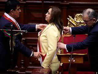 Dina Boluarte receives the presidential sash as she is sworn-in as the new president at Congress in Lima, Peru, in this file photo taken on Wednesday, Dec. 7, 2022. Boluarte was removed in a swift impeachment trial on Friday (October 11, 2025).
