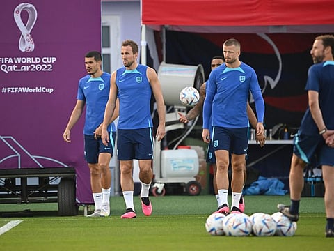 From left: England's Conor Coady, Harry Kane and Eric Dier come out for a training session overseen by England's coach Gareth Southgate (right) at Al Wakrah SC Stadium.