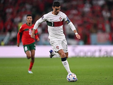 Portugal's Cristiano Ronaldo runs with the ball.