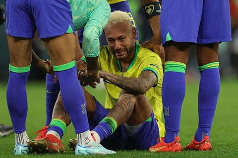 Brazil's forward Neymar reacts after his team lost the Qatar 2022 World Cup quarter-final match against Croatia on penalties at Education City Stadium in Al-Rayyan, west of Doha.