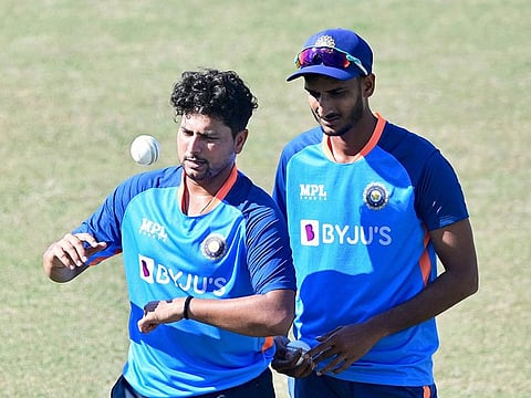 India’s Kuldeep Yadav (L) and Shahbaz Ahmed (R) attend a practice session at the Zahur Ahmed Chowdhury Stadium in Chattogram on December 9, 2022, ahead of their third and final ODI match against Bangladesh. 