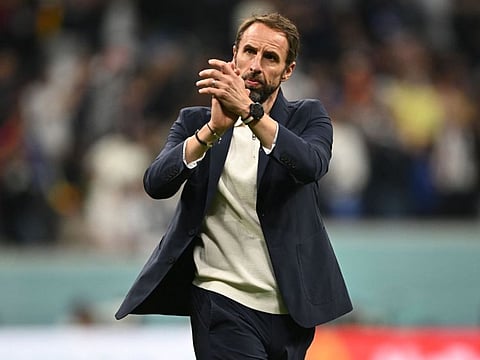 England's coach Gareth Southgate reacts at the end of the Qatar 2022 World Cup quarter-final match against France at the Al-Bayt Stadium in Al Khor, north of Doha. France won 2-1.