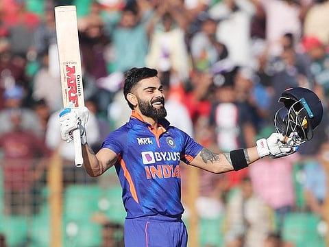 India's Virat Kohli raises his bat after completing his century during the 3rd ODI match against Bangladesh, at Zahur Ahmed Chowdhury Stadium, in Chattogram on Saturday. 