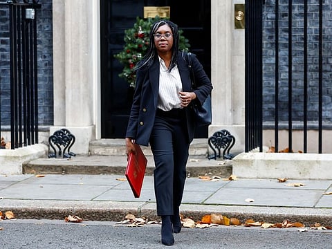 British Secretary of State for International Trade Kemi Badenoch walks outside Downing Street in London, Britain December 6, 2022.