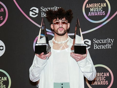 Bad Bunny, winner of the Favourite Male Latin Artist award, poses in the press room during the 2021 American Music Awards at the  Microsoft Theater in Los Angeles, California, US, November 21, 2021.