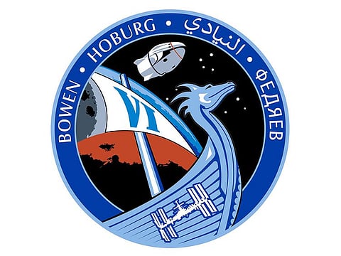 His surname AlNeyadi is written in Arabic on the mission logo 