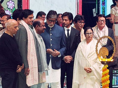 Kolkata Film Festival: West Bengal Governor CV Anand Bose, Chief Minister Mamata Banerjee, Bollywood actors Amitabh Bachchan, Shahrukh Khan, TMC leader Shatrughan Sinha, filmmaker Mahesh Bhatt, and others during the inaugural program of the 28th International Kolkata Film Festival, at Netaji Indoor Stadium, in Kolkata on Thursday. 
