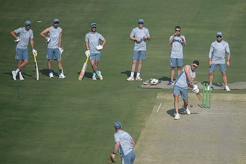 England's James Anderson plays a shot during a training session ahead of the third Test against Pakistan at the National Stadium in Karachi on Friday.