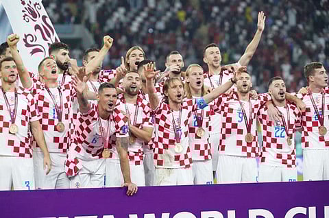 Croatia celebrate after defeating Morocco to win the third place match of the FIFA World Cup 2022 at Khalifa International Stadium in Al Rayyan, Qatar.