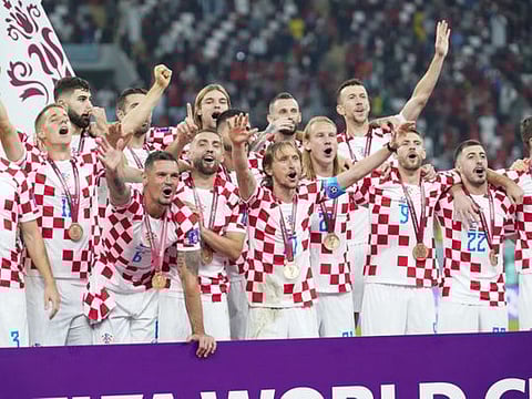 Croatia celebrate after defeating Morocco to win the third place match of the FIFA World Cup 2022 at Khalifa International Stadium in Al Rayyan, Qatar.