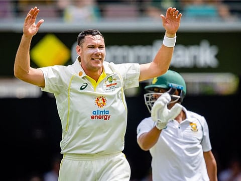 Australia's Scott Boland celebrates after taking the wicket of South Africa's Marco Jansen in first Test. The return of Josh Hazlewood has put his situation in trouble.