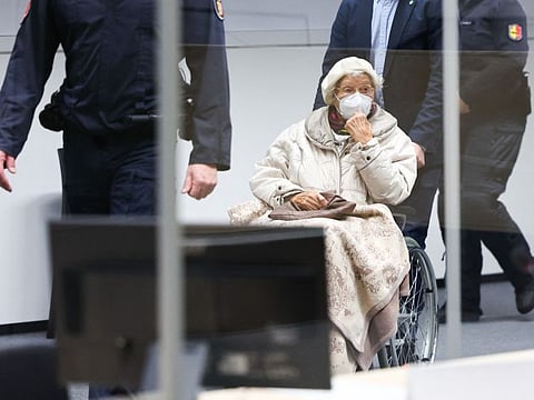 Defendant Irmgard F, a former secretary for the SS commander of the Stutthof concentration camp, is brought to a courtroom in Itzehoe, northern Germany, where her verdict was spoken on December 20, 2022.