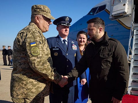 Ukrainian President Volodymyr Zelensky greeted by an unidentified Ukrainian military official upon arrival at Joint Base Andrews in Maryland.
