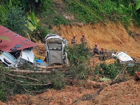 File photo: Rescue teams continue the search for victims caught in a landslide, Saturday, Dec. 17, 2022, in Batang Kali, Malaysia. A landslide Friday, Dec. 16, 2022, at a tourist campground in Malaysia left more than a dozen of people dead and authorities said a dozen of others were feared buried at the site on an organic farm outside the capital of Kuala Lumpur. 