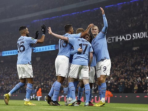 Manchester City's Erling Haaland (right) celebrates scoring against Liverpool during the Carabao Cup Round of 16 match at the Etihad Stadium, Manchester, Britain.