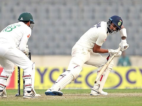 India's captain KL Rahul plays a shot during the Day 1 of the 2nd Test match against Bangladesh at Shere Bangla National Stadium, in Dhaka.