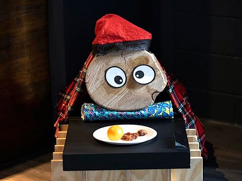 In photos: Clothe and feed a 'Christmas log' to receive gifts at Andorra Pavilion