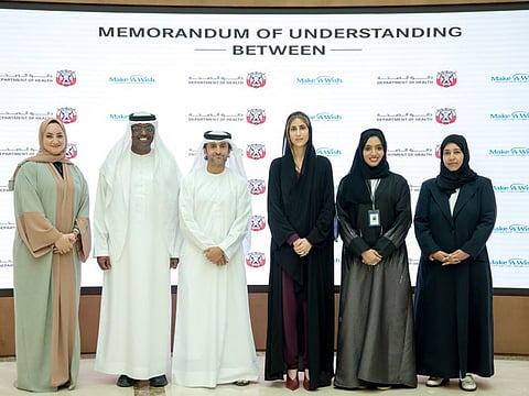Representatives from the Department of Health – Abu Dhabi and Make-A-Wish Foundation during the agreement signing ceremony