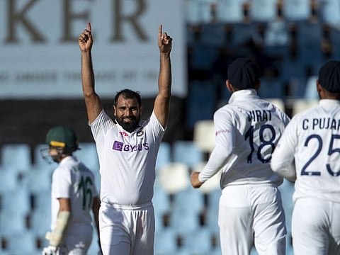 Indian pacer Mohammed Shami reacts after taking his career 200th Test wicket during the third day of the first Test against South Africa in Centurion on Tuesday.