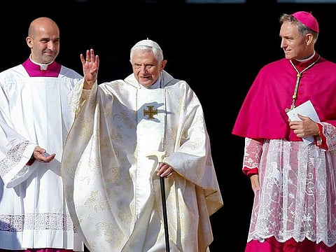 File photo: Emeritus Pope Benedict XVI waves as he arrives to attend a mass for the beatification of former pope Paul VI in St. Peter's square at the Vatican October 19, 2014. 