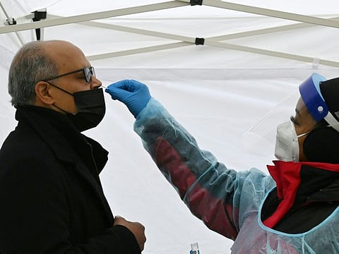 A man gets tested for Covid-19 at a testing site in Washington, DC, on December 29, 2021.  