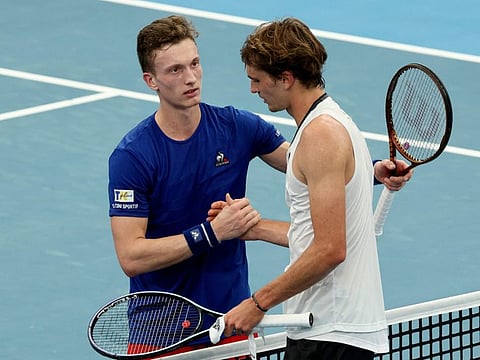 Czech Republic's Jiri Lehecka (left) shakes hands with Germany's Alexander Zverev after their men's singles match on day three of the United Cup in Sydney.