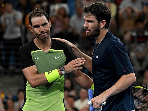 Britain's Cameron Norrie (right) shakes hands with Rafael Nadal of Spain after winning in the men's singles match on day three of the United Cup tennis tournament in Sydney.