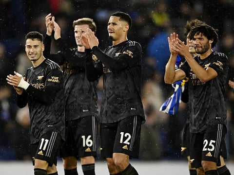 (From left) Arsenal's Gabriel Martinelli, Rob Holding, William Saliba and Mohamed Elneny celebrate after the match against Brighton which they won 4-2.