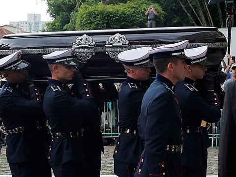 The coffin of the late Brazilian football star Pele is transported to the Santos' Memorial Cemetery after the funeral procession in Santos, Sao Paulo state, Brazil on January 3, 2023.