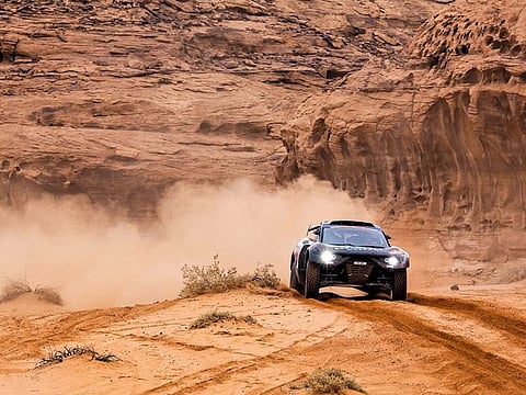 Frenchman Guerlain Chicherit presented Bahrain Raid Xtreme with a brilliant comeback victory in the Dakar Rally today as rain and poor visibility cut short the third special stage in Saudi Arabia.