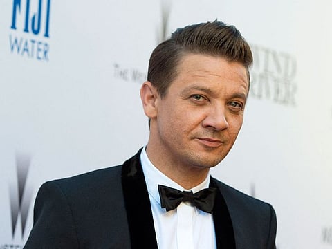 Renner holds the honorary title of deputy sheriff and is popular with local children.