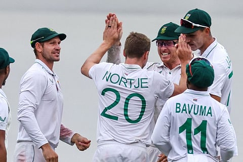South Africa's Anrich Nortje (centre) celebrates with team mates after dismissing Australias Marnus Labuschagne during the third Test at the Sydney Cricket Ground (SCG) in Sydney.
