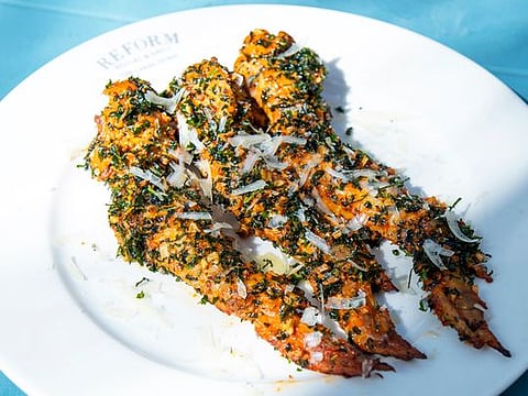 Grilled Peri-peri chicken wings with crispy Gremolata