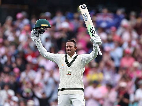 Australia’s Usman Khawaja celebrates reaching his century during day two of the third Test against South Africa at the Sydney Cricket Ground (SCG) in Sydney on January 5, 2023.  