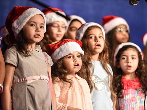 Children sing Christmas songs at the Coptic St. Mina Jebel Ali Church in Dubai in this file photo.