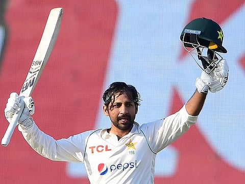 Pakistan's Sarfaraz Ahmed celebrates after scoring a century during the fifth and final day of the second Test against New Zealand  in Karachi on Friday.