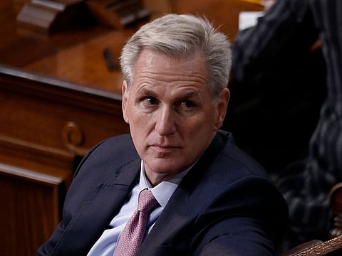 US Republican Representative of California Kevin McCarthy listens as lawmakers take a 13th vote for House Speaker at the US Capitol in Washington, DC, on January 6, 2023. 